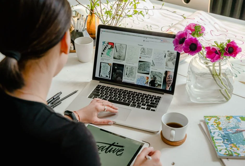 A modern workspace featuring a laptop, tablet, and smartphones, well suited for tech and freelance use.